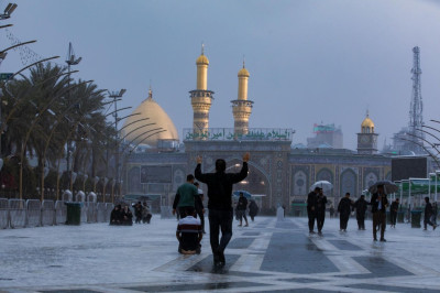 Rain graces the golden domes of Karbala, the city of Imam Hussain (peace be upon him)