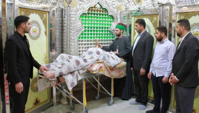 Malgré une tétraplégie, le Saint Sanctuaire de l’Imam Hussein transfère un blessé de Wasit à Karbala pour exaucer son vœu de visite
